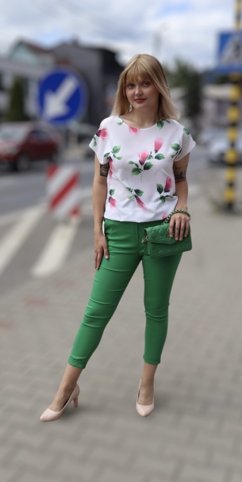 Zielone spodnie damskie dopasowane z elastycznego materiału